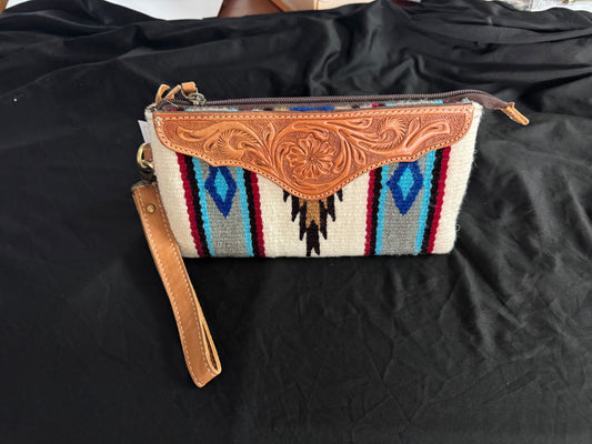 Tan tooled leather saddle blanket clutch