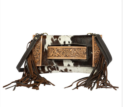 Cowhide tooled hand clutch bag